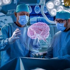Photo of Surgeons Perform Brain Surgery Using Augmented Reality, Animated 3D Brain. High Tech Technologically Advanced Hospital